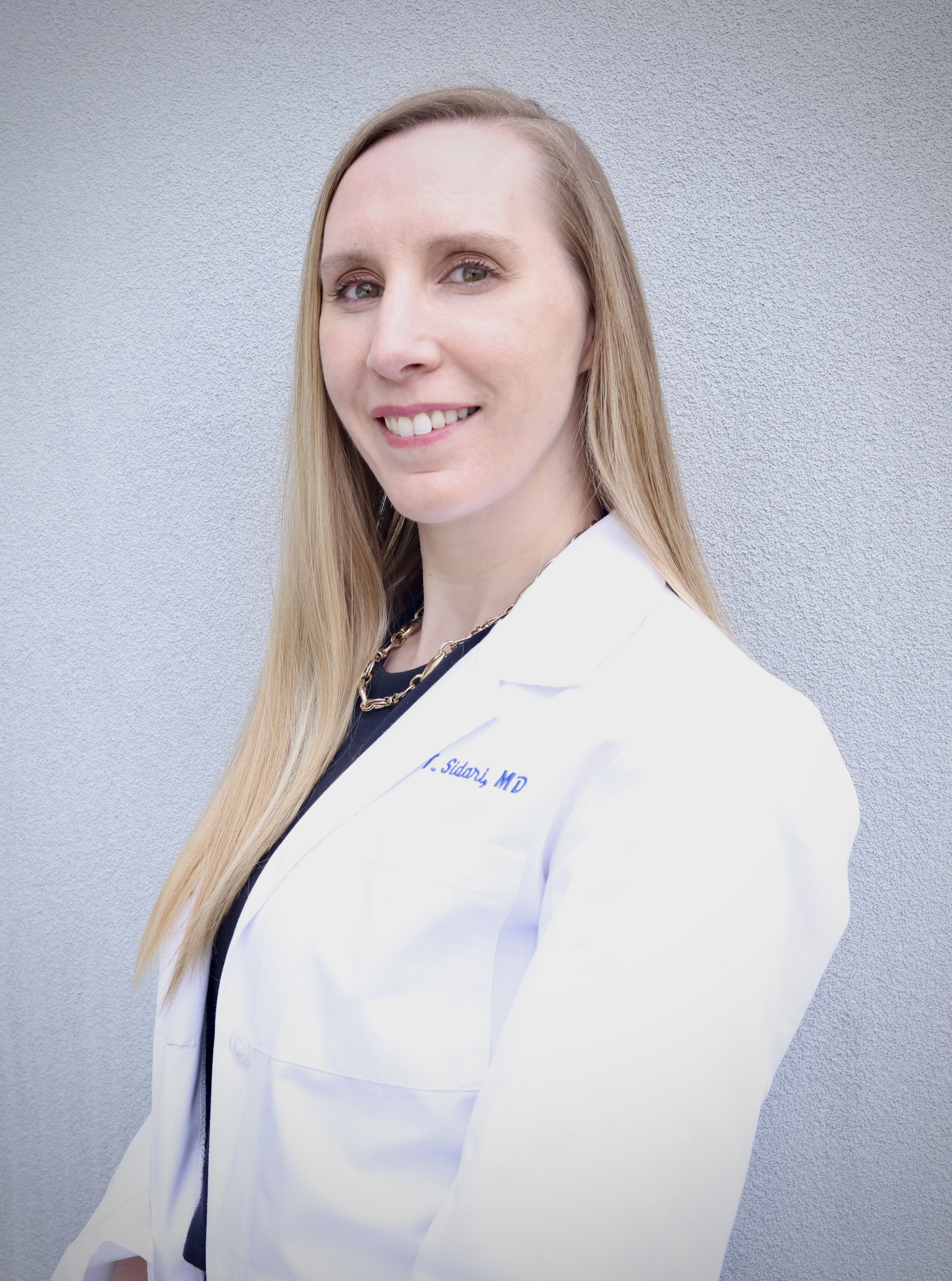 Dr. Laura T. Sidari, MD — founder of Sidari Consultants